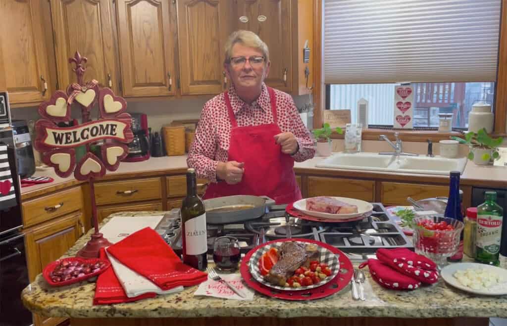Carolyn cooking steak for News on 6