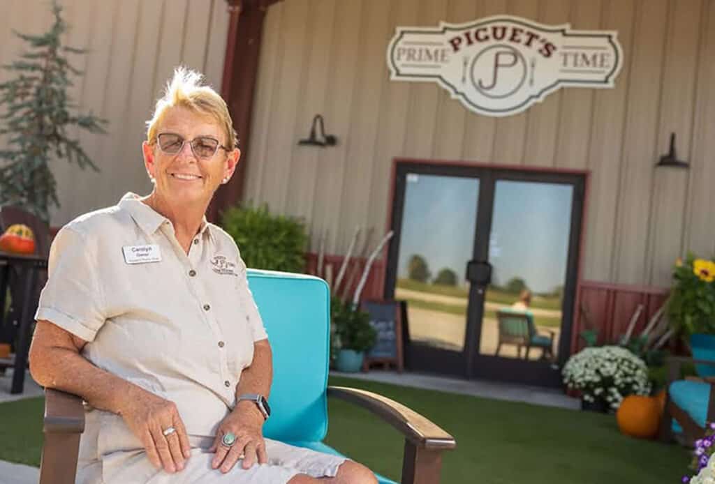 Carolyn in front of restaurant